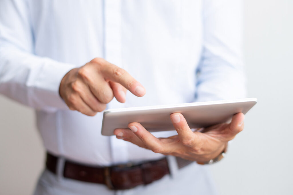 businessman using GeStampi on tablet
